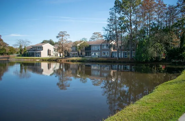 a view of a lake with a house