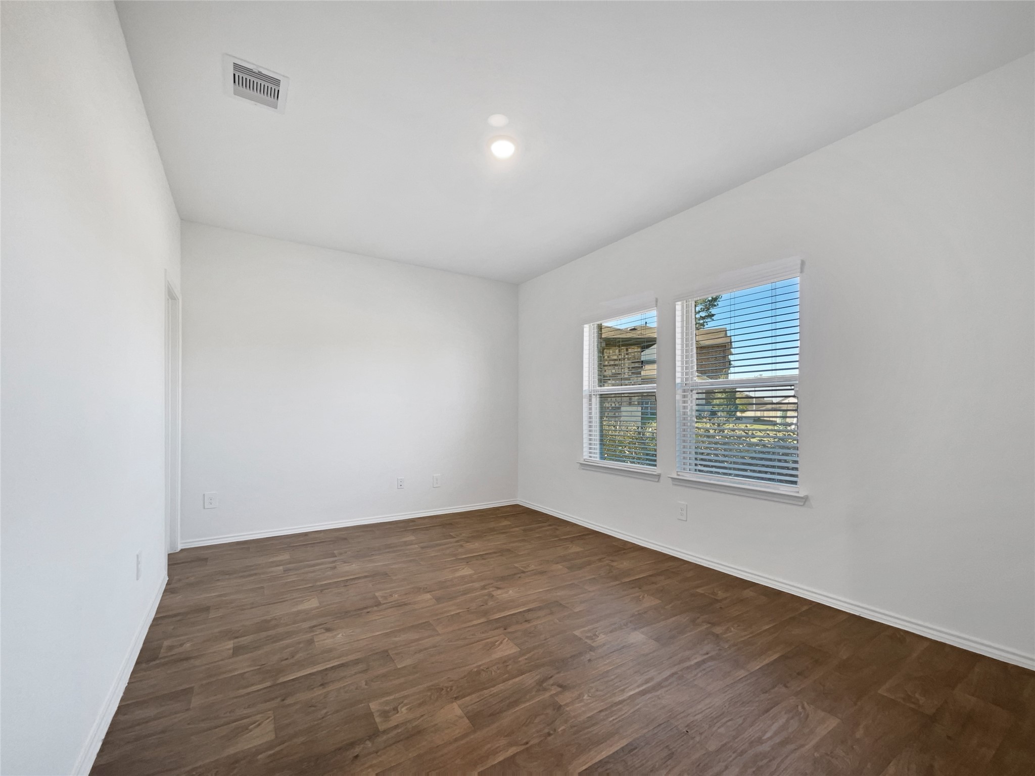 13912 Acadia Point Court Conroe, TX 77384 - Photo 11 of 19 an empty room with a window