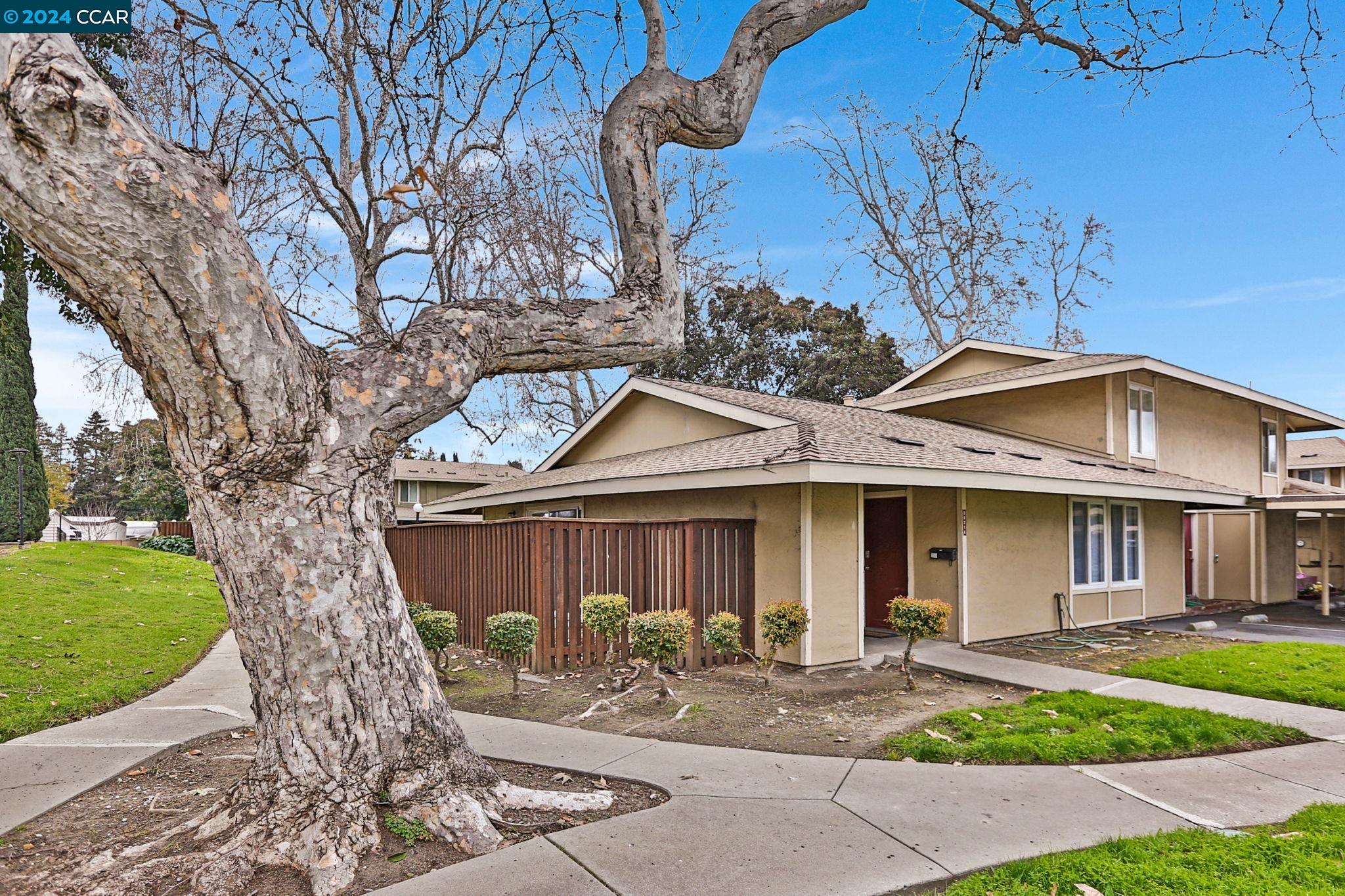 2071 Olivera Road, Unit A Concord, CA 94520 - Photo 1 of 1 a front view of a house with garden