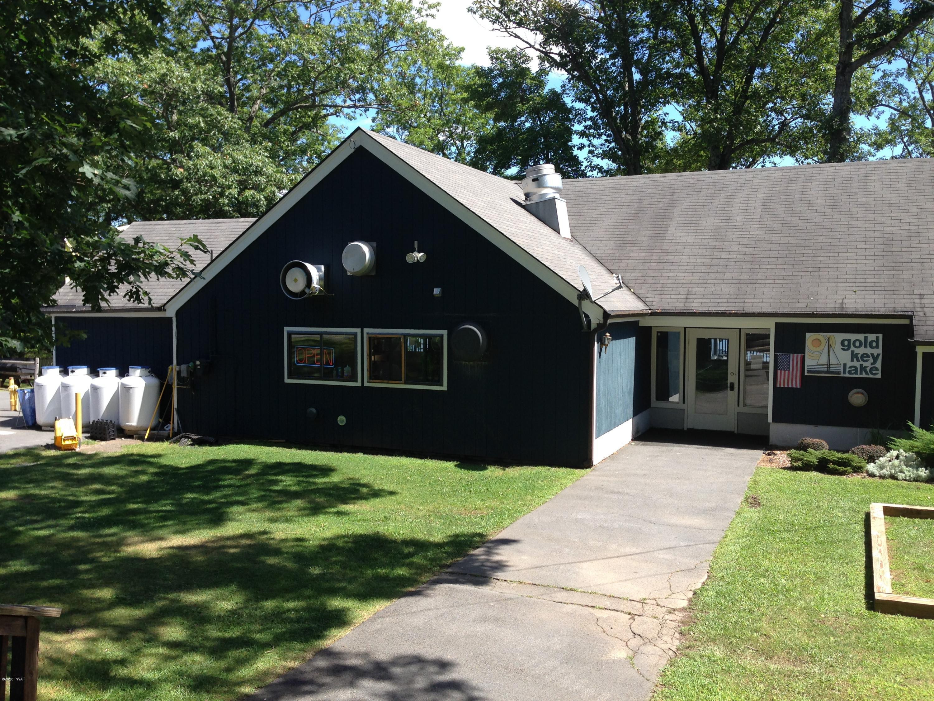 183 Yale Road Milford, PA 18337 - Photo 22 of 26 a front view of a house with a yard