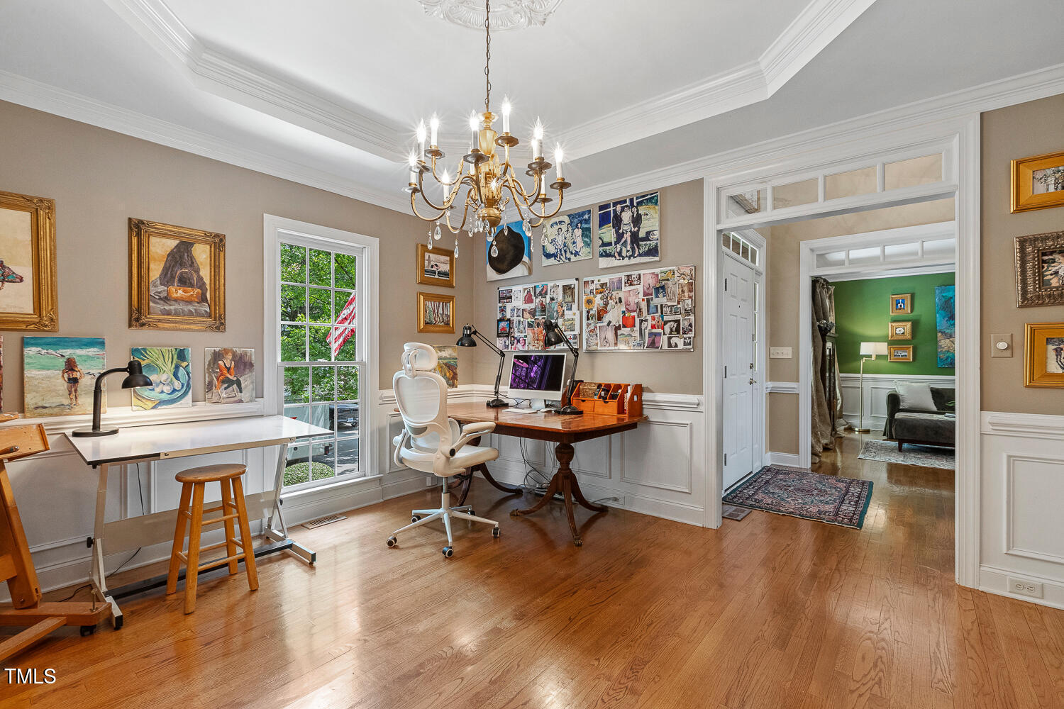 500 Potomac Grove Place Cary, NC 27519 - Photo 23 of 77 a living room with furniture and a chandelier