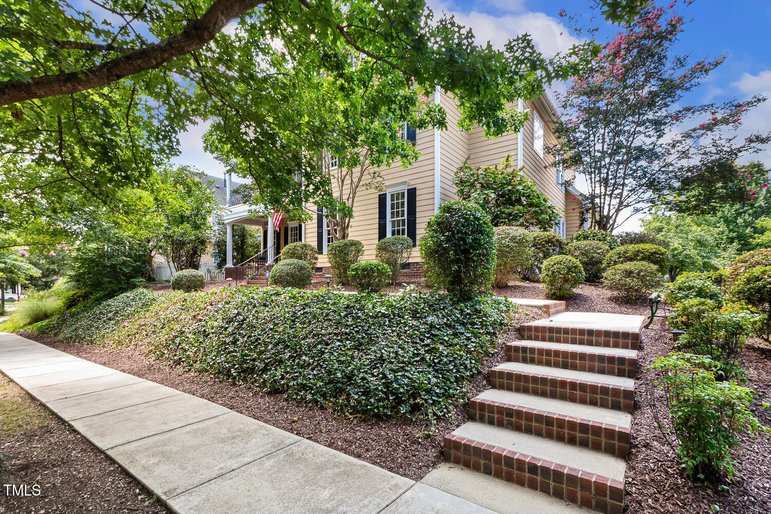 500 Potomac Grove Place Cary, NC 27519 - Photo 3 of 77 a front view of a house with a yard
