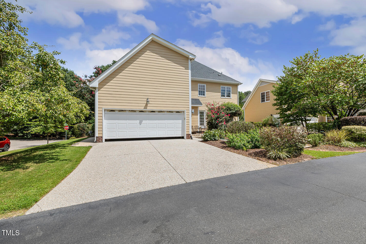 500 Potomac Grove Place Cary, NC 27519 - Photo 55 of 77 a view of a house with a yard and garage