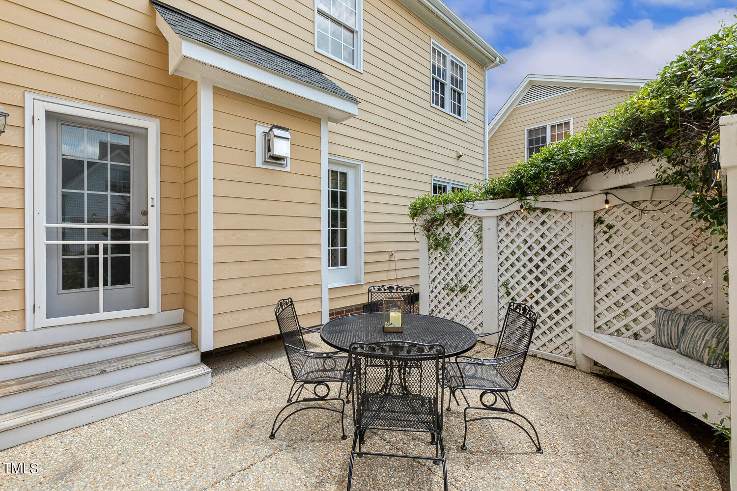 500 Potomac Grove Place Cary, NC 27519 - Photo 56 of 77 a view of a patio with a table and chairs