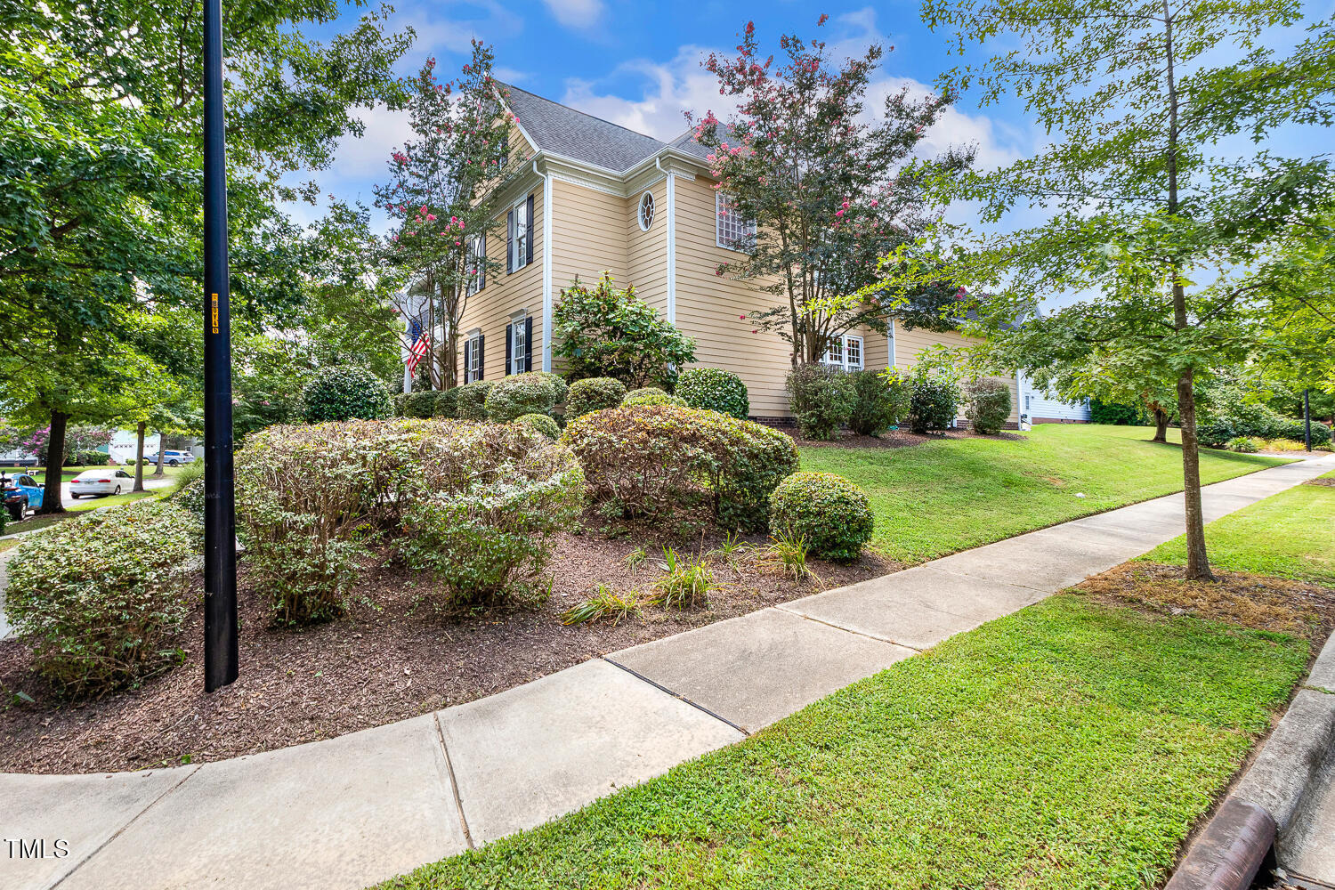 500 Potomac Grove Place Cary, NC 27519 - Photo 60 of 77 a front view of a house with a yard