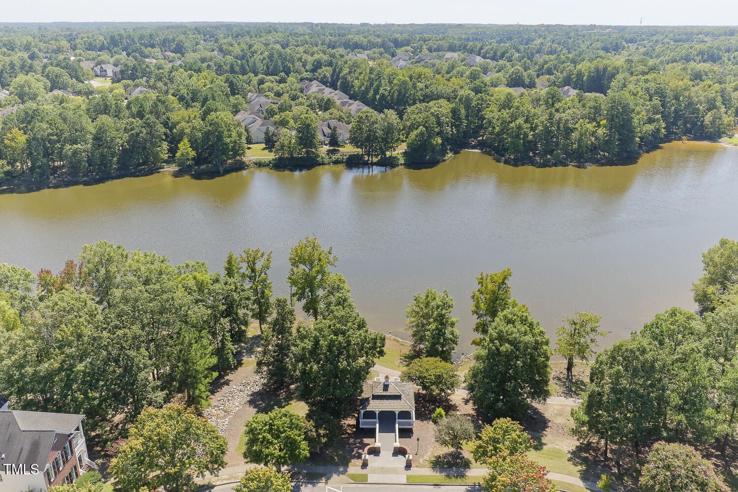 500 Potomac Grove Place Cary, NC 27519 - Photo 76 of 77 an aerial view of a houses with a lake view