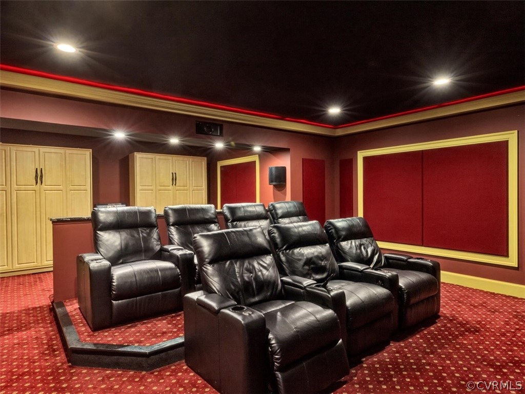 13702 Beechwood Point Road Midlothian, VA 23112 - Photo 29 of 50 a media room with lots of chairs and a projector screen