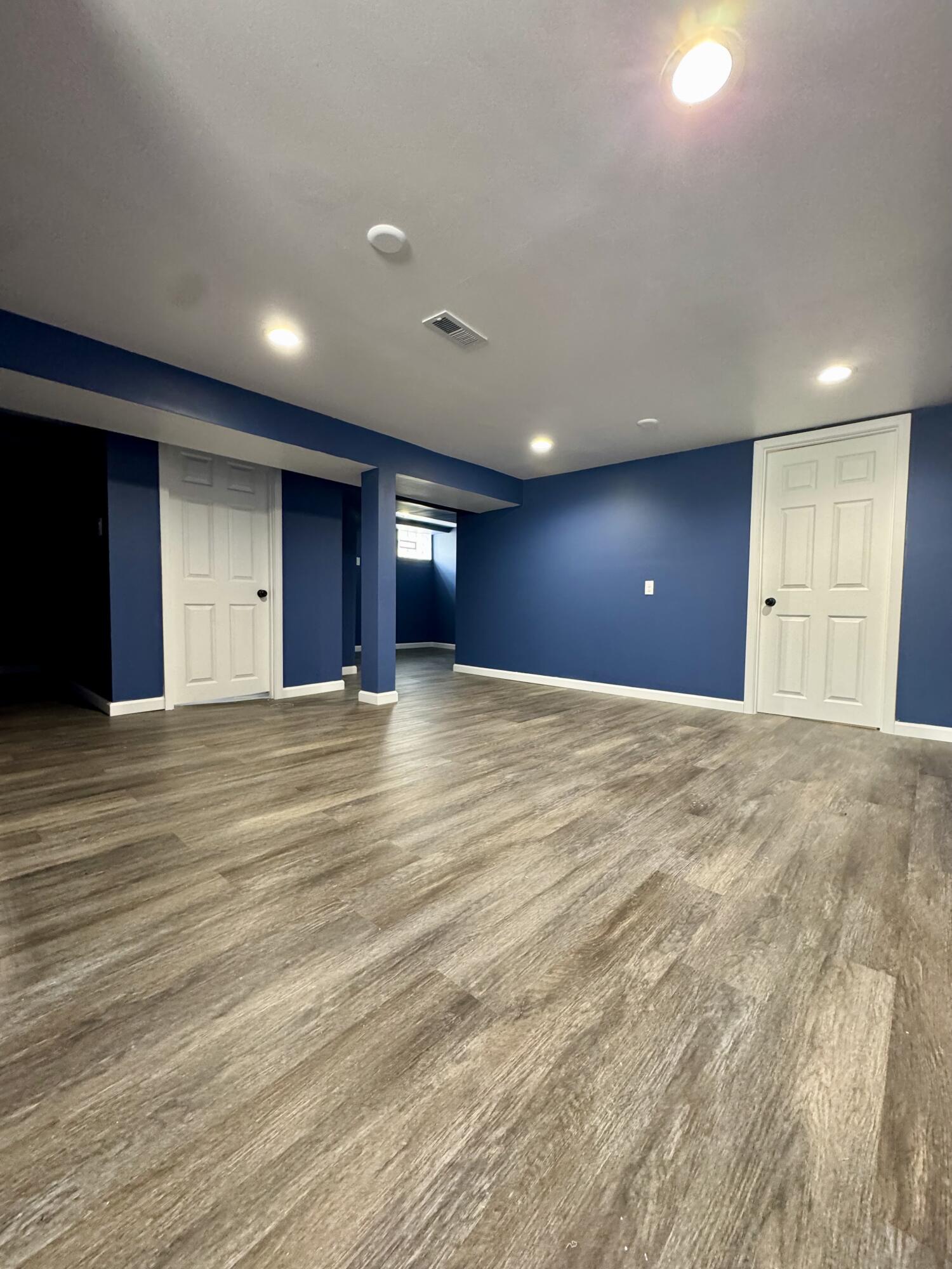 564 Hamlin Street Gary, IN 46406 - Photo 8 of 14 a view of an empty room with wooden floor