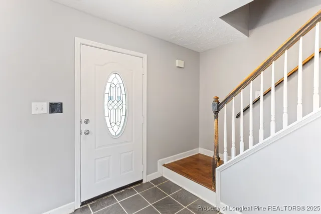a view of entryway with wooden floor