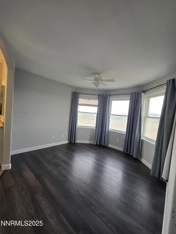 a bathroom with double vanity sinks and a shower