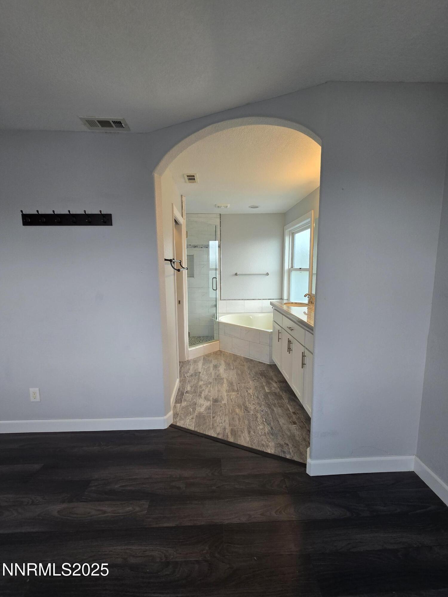 20 Simons Road Fernley, NV 89408 - Photo 20 of 56 a room with wooden floor and a sink