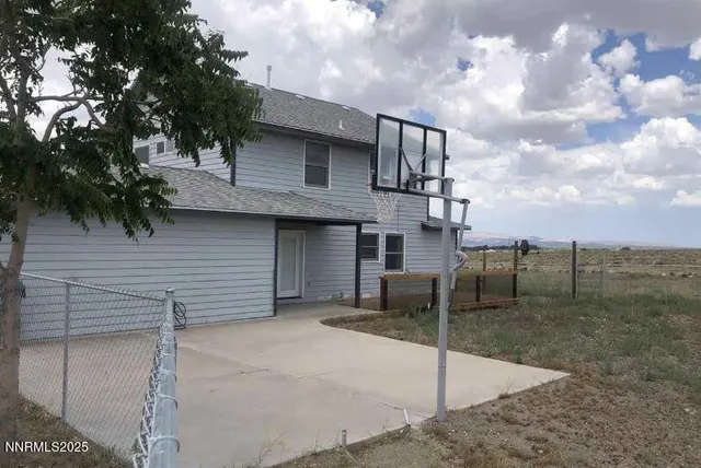 a view of an ocean beach and city
