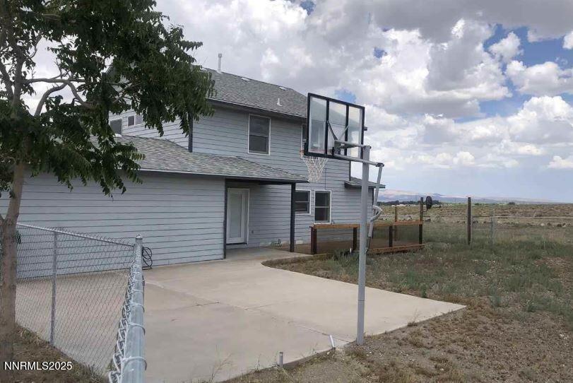 20 Simons Road Fernley, NV 89408 - Photo 38 of 56 a backyard of a house with shaded area