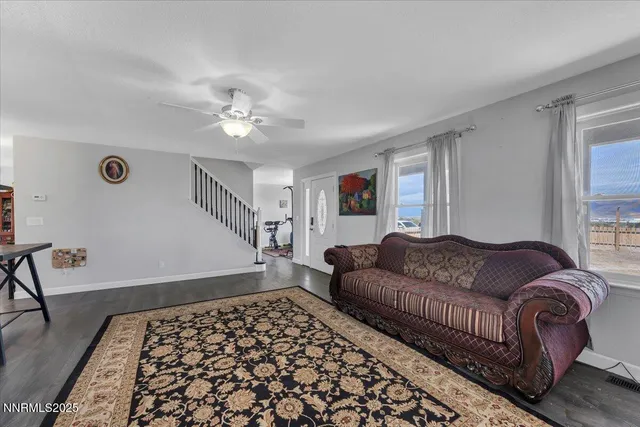 a living room with furniture and a couch