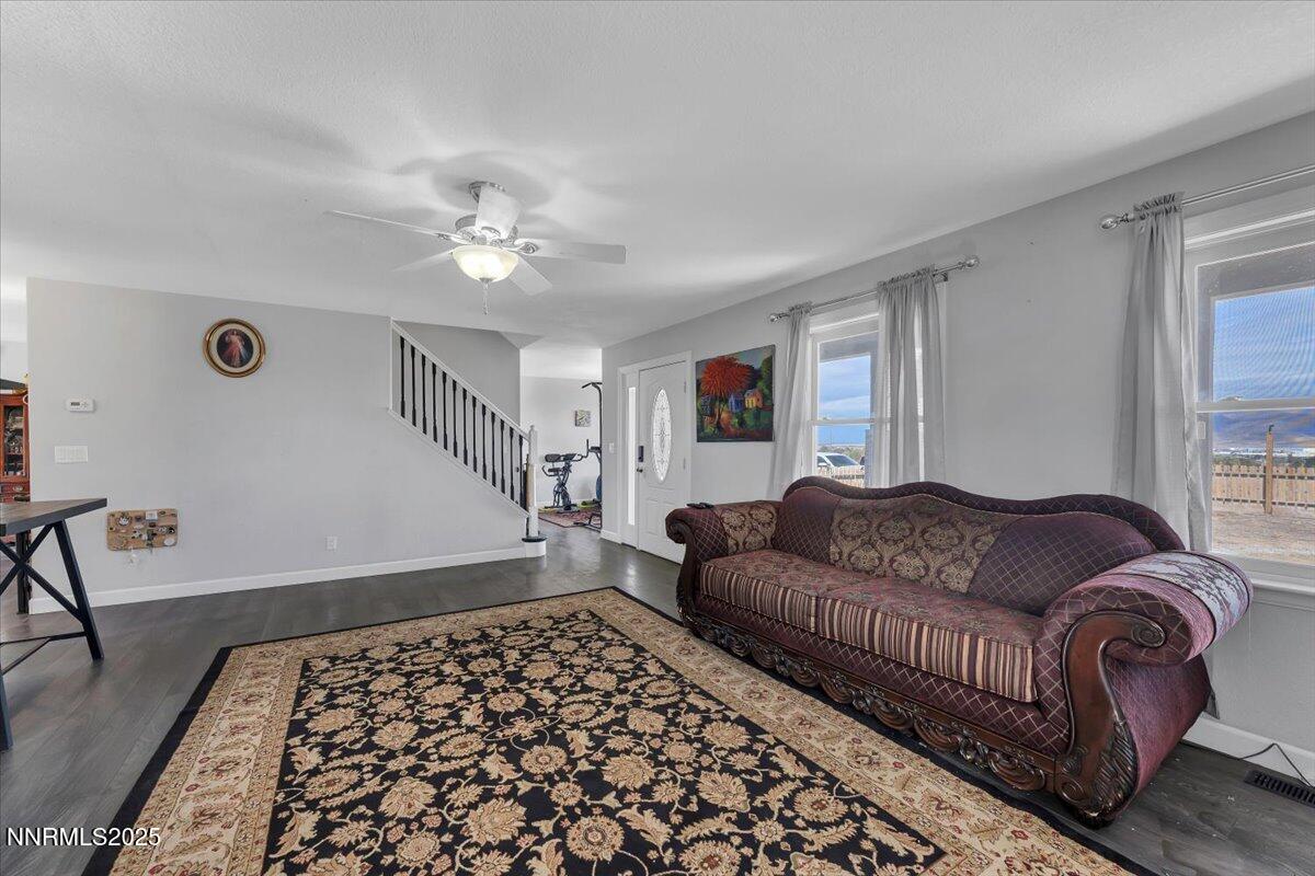 20 Simons Road Fernley, NV 89408 - Photo 4 of 56 a living room with furniture and a couch