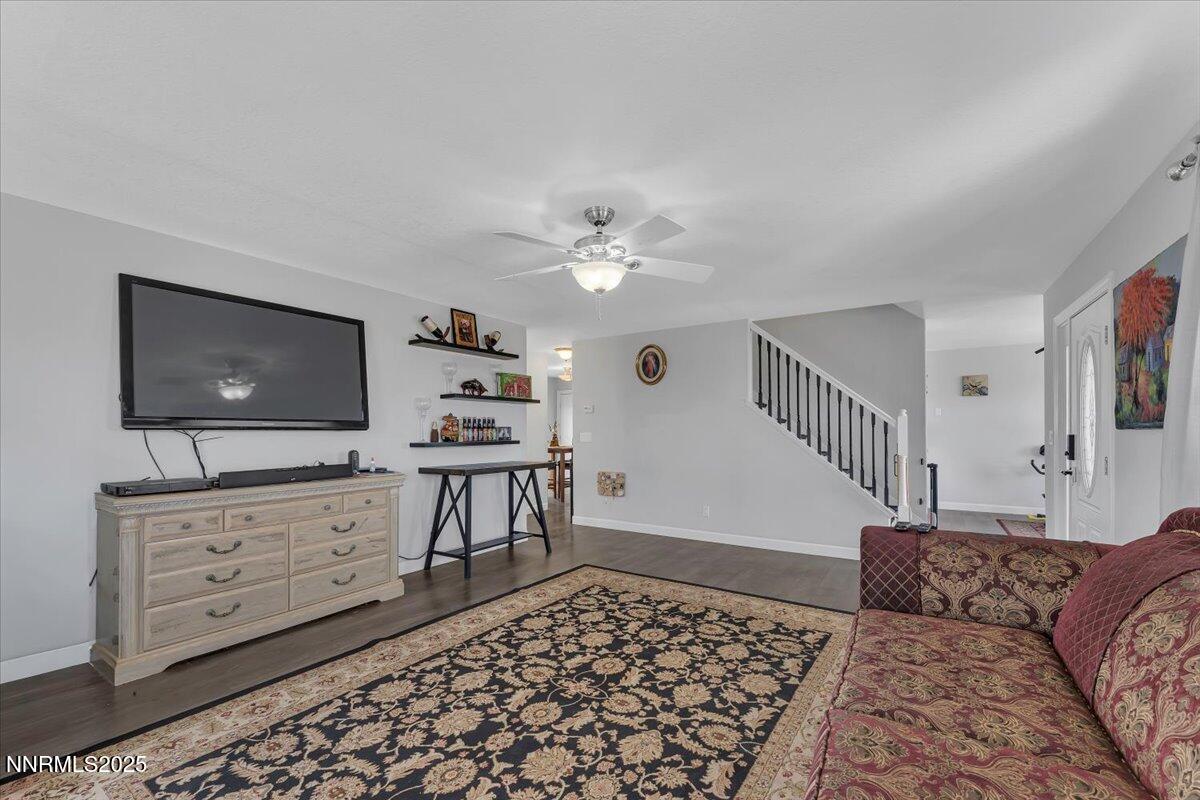 20 Simons Road Fernley, NV 89408 - Photo 7 of 56 a living room with furniture and a flat screen tv