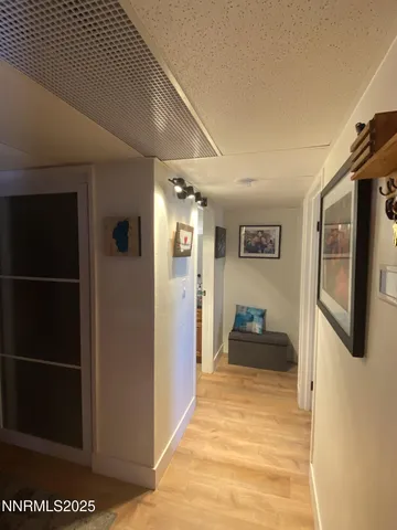 a bedroom with a bed and walk in closet