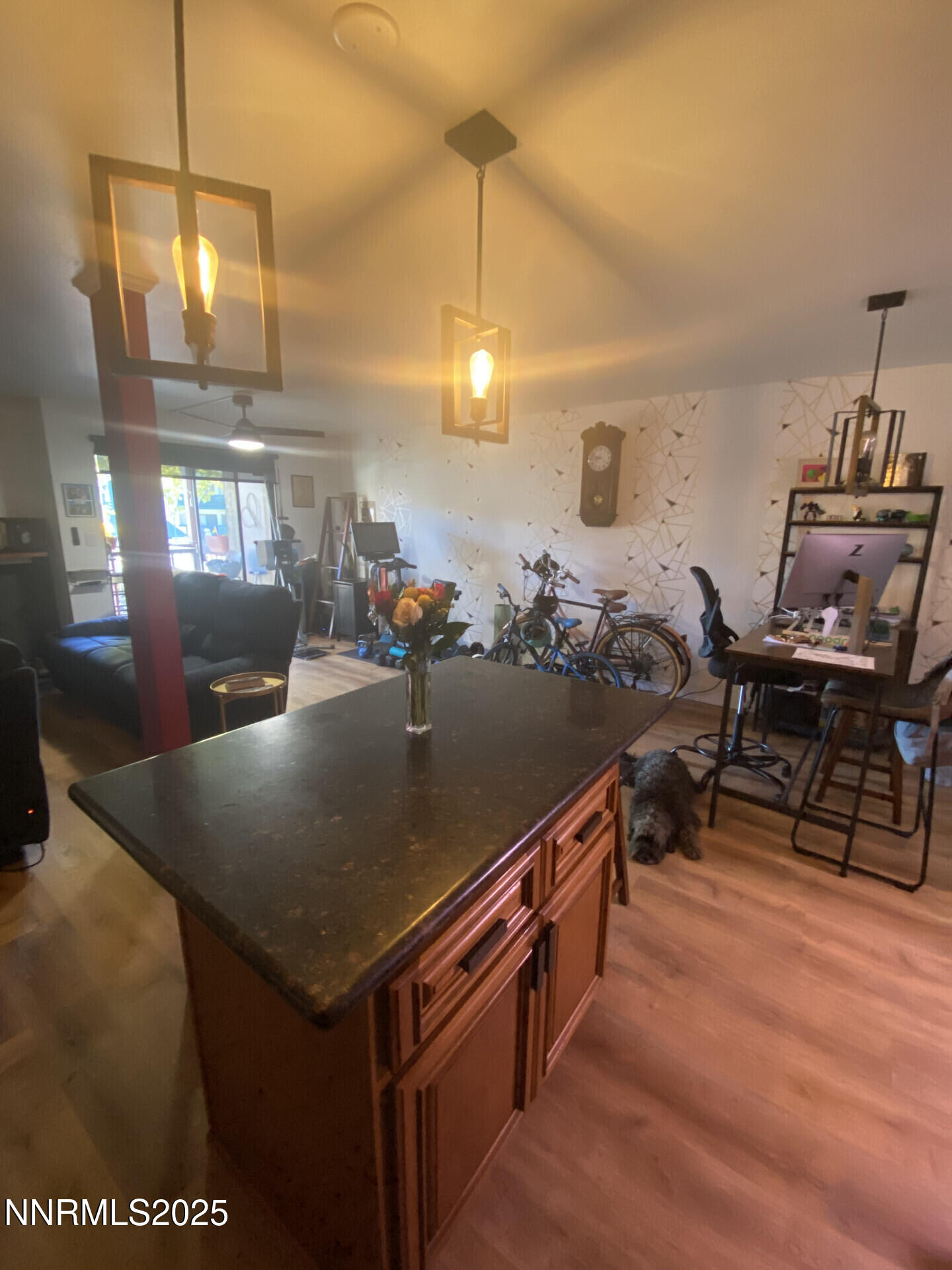 2955 Lakeside Drive, Unit 217 Reno, NV 89509 - Photo 4 of 10 a view of a dining room with furniture and chandelier