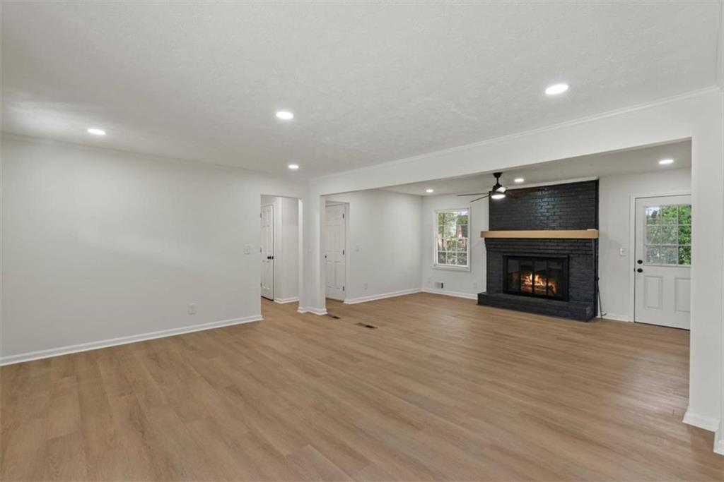 4328 Luxembourg Drive Decatur, GA 30034 - Photo 8 of 27 a view of an empty room with a fireplace