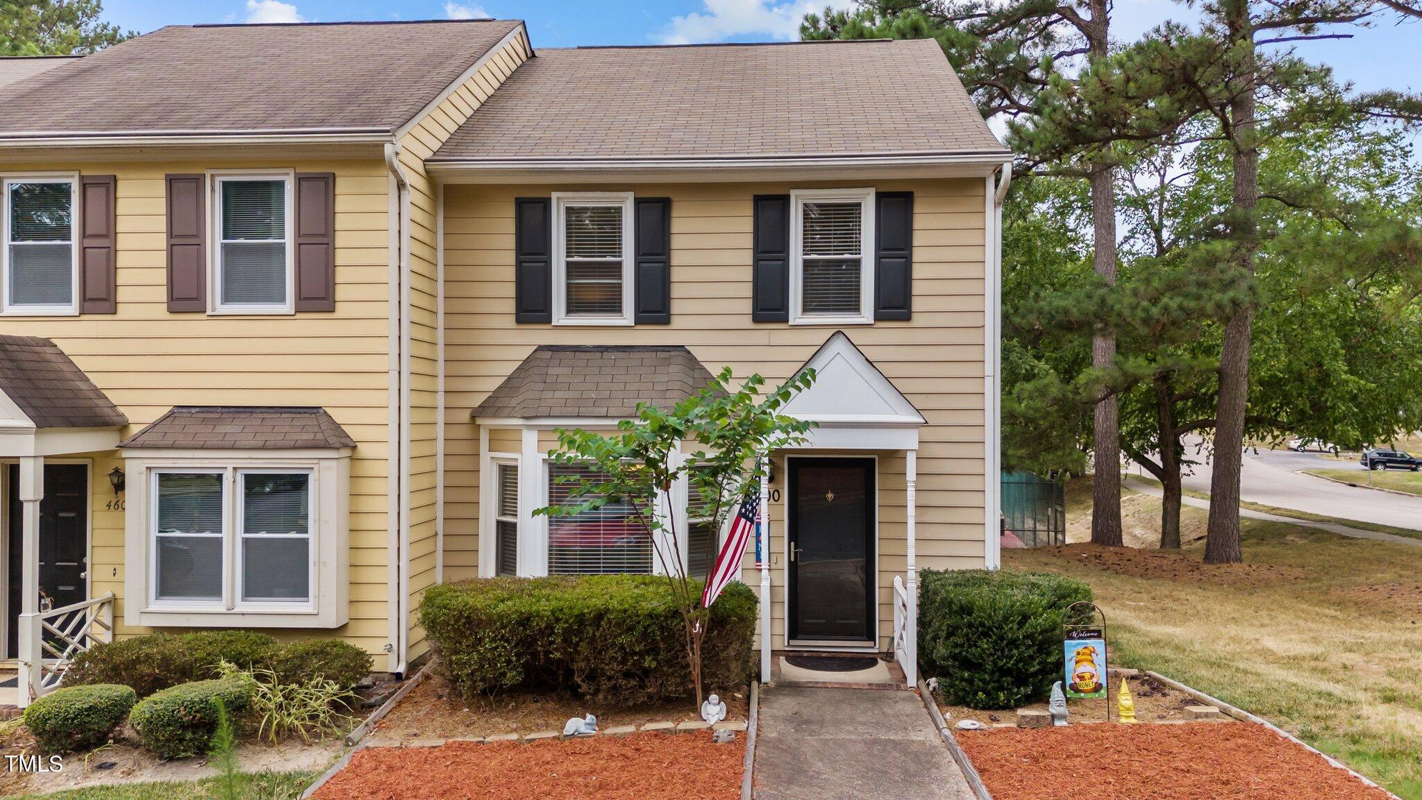 4600 Jacqueline Lane Raleigh, NC 27616 - Photo 2 of 34 a front view of a house with garden