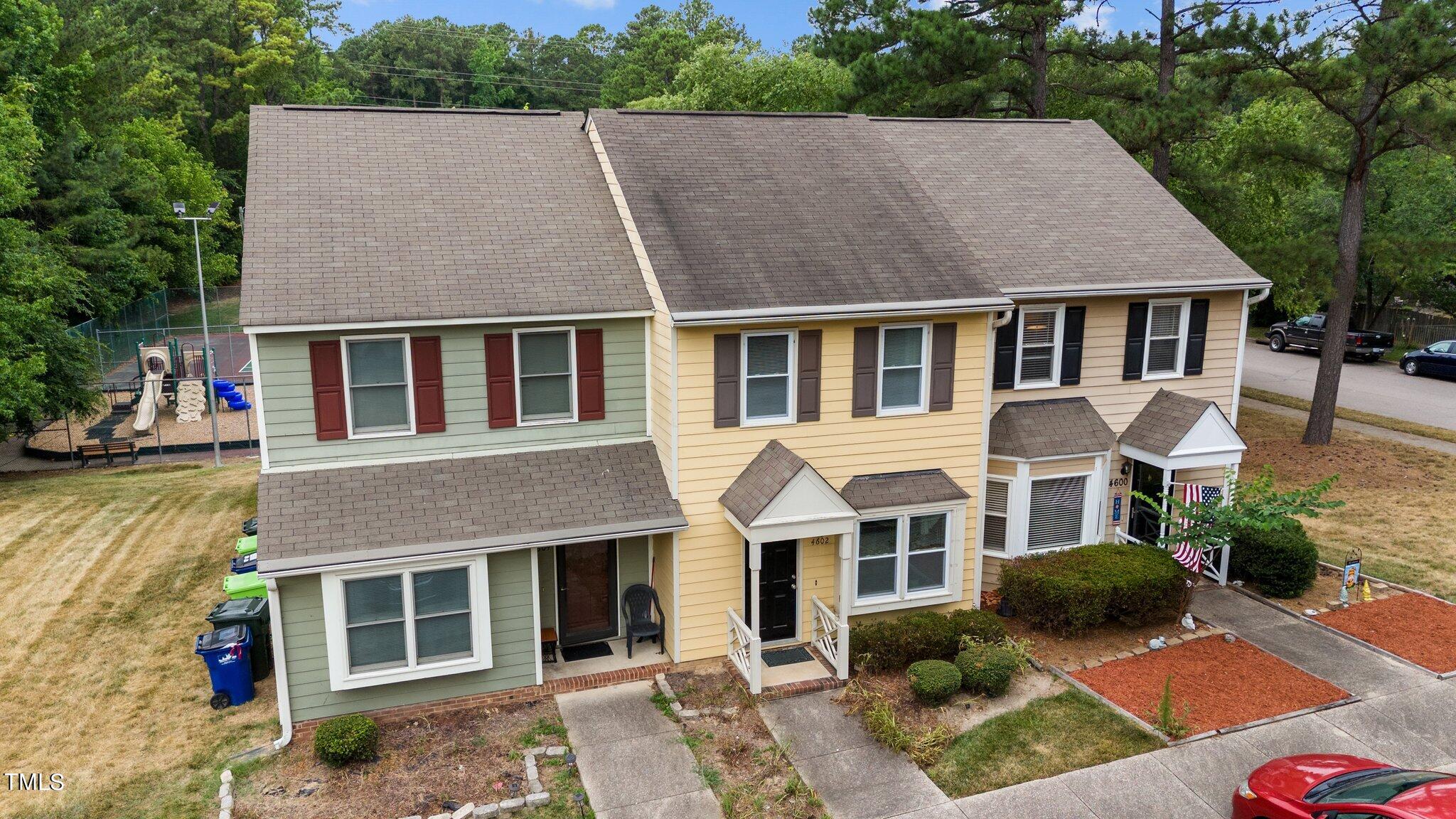 4600 Jacqueline Lane Raleigh, NC 27616 - Photo 34 of 34 a aerial view of a brick house many windows and yard