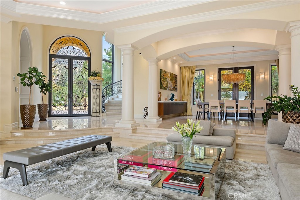 105 Oak Grove Monrovia, CA 91016 - Photo 11 of 46 a living room with furniture and a floor to ceiling window