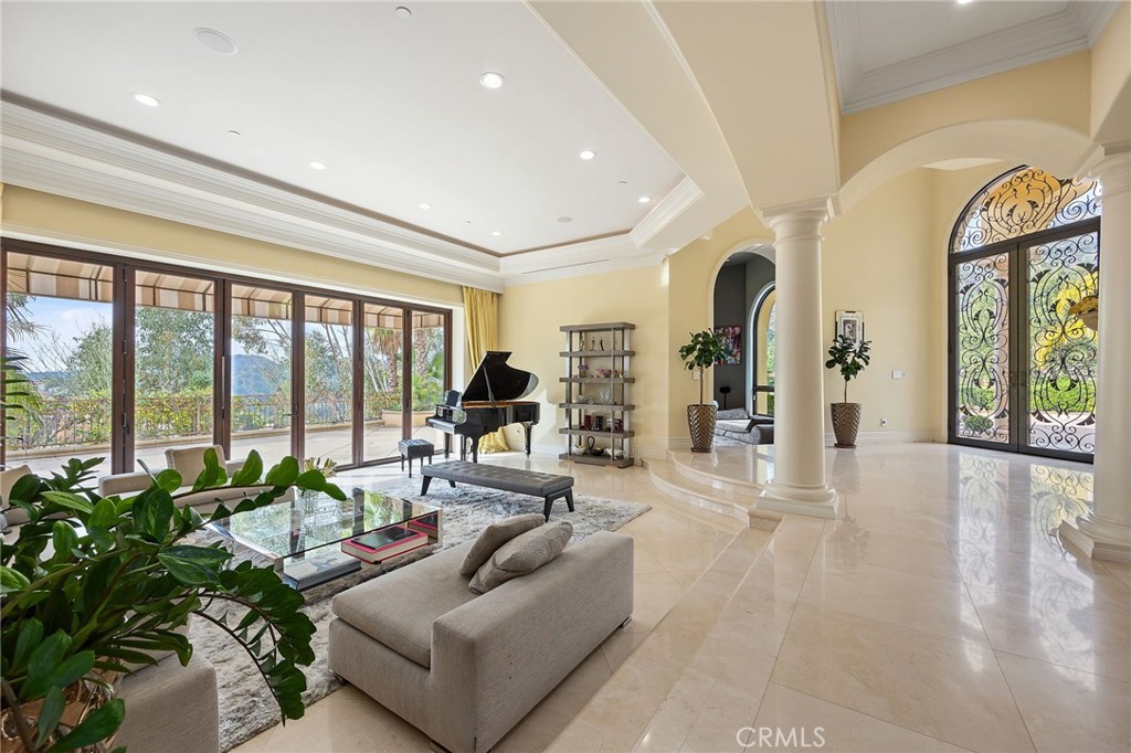 105 Oak Grove Monrovia, CA 91016 - Photo 12 of 46 Bifold doors open all the way, showcasing the gorgeous view outside the formal living room.
