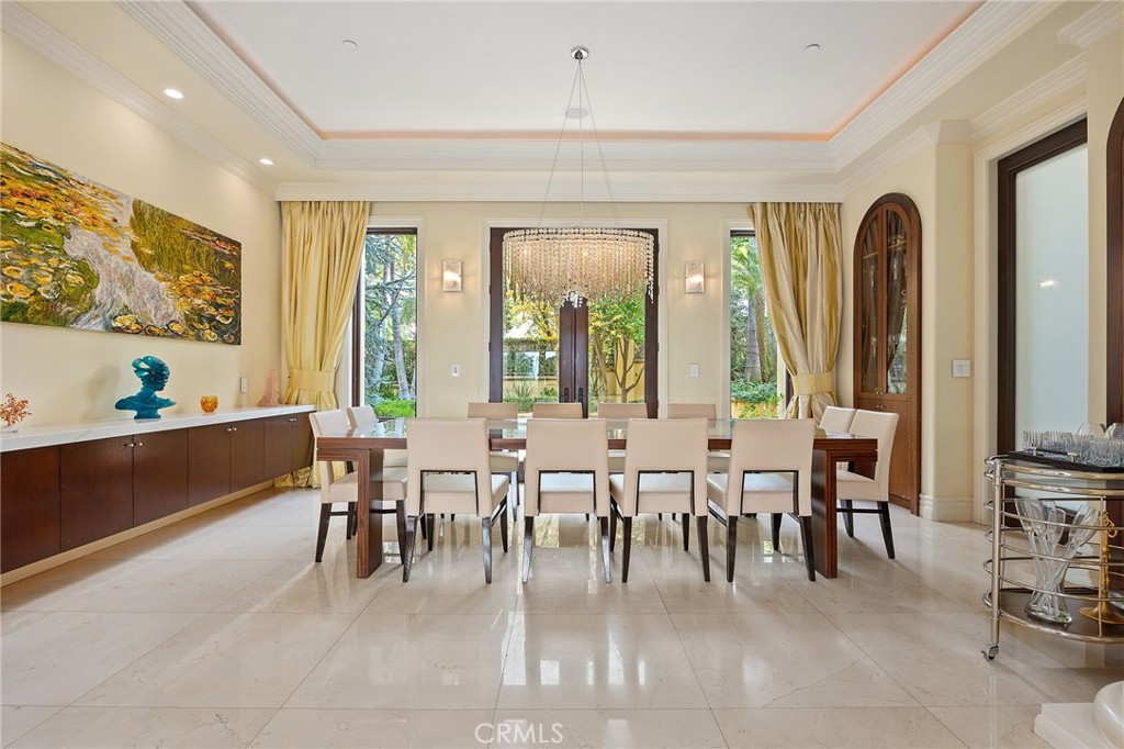 105 Oak Grove Monrovia, CA 91016 - Photo 13 of 46 a dining hall with couches and dining table with wooden floor