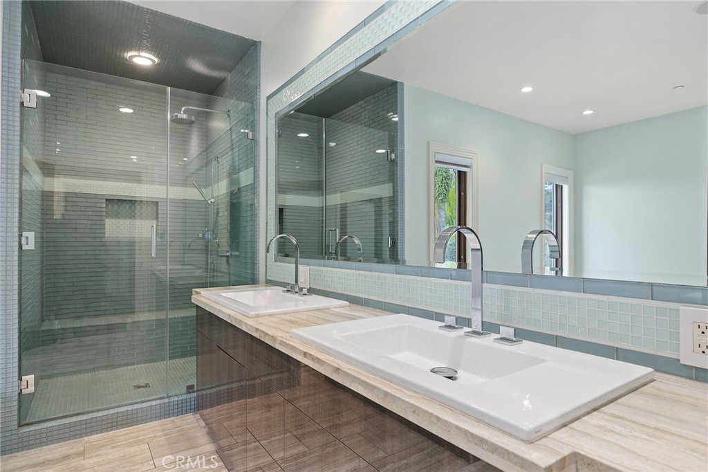 105 Oak Grove Monrovia, CA 91016 - Photo 28 of 46 a bathroom with a sink shower and a mirror