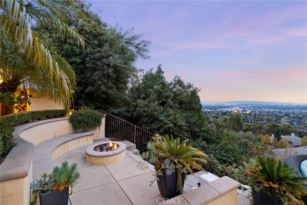 105 Oak Grove Monrovia, CA 91016 - Photo 3 of 46 Gas Fire pit and viewing area. Perfect sitting area for your next party, or to watch the fireworks below.