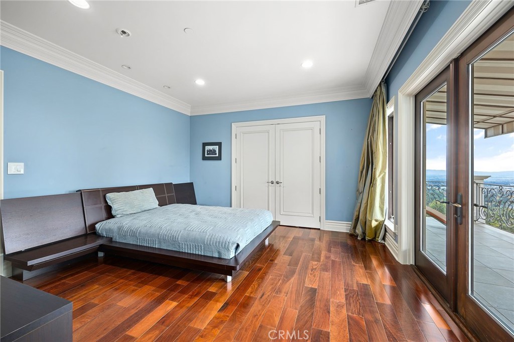 105 Oak Grove Monrovia, CA 91016 - Photo 32 of 46 a bedroom with a bed and a large window