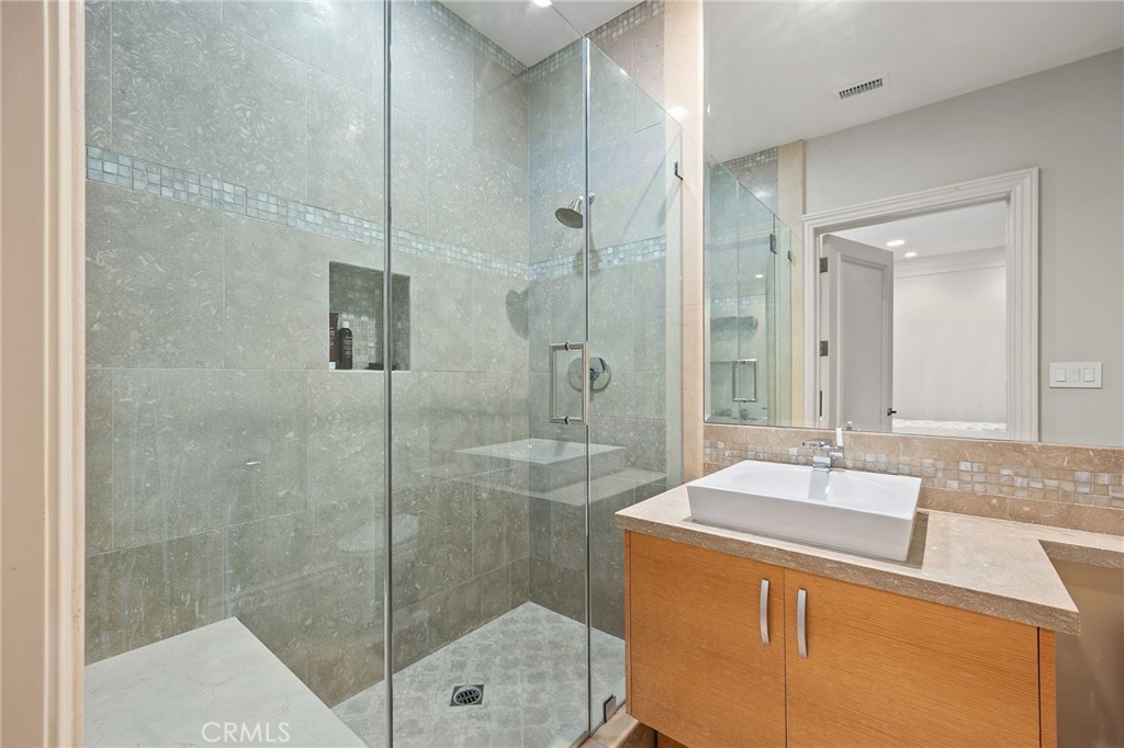105 Oak Grove Monrovia, CA 91016 - Photo 35 of 46 a bathroom with a sink and a mirror