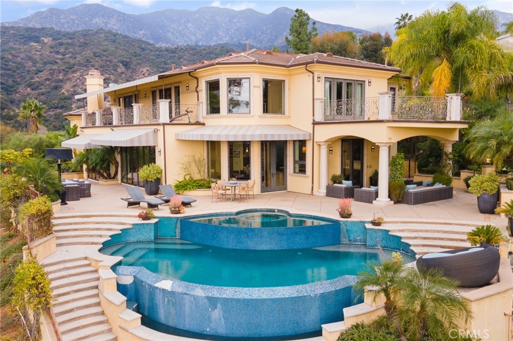 105 Oak Grove Monrovia, CA 91016 - Photo 38 of 46 a view of a house with pool and chairs