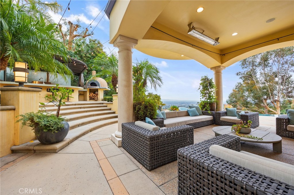 105 Oak Grove Monrovia, CA 91016 - Photo 44 of 46 a balcony with furniture and a potted plant