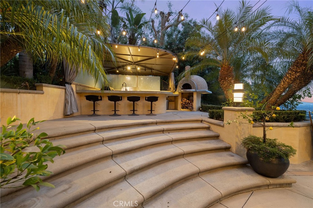 105 Oak Grove Monrovia, CA 91016 - Photo 7 of 46 Stairs up to the outdoor kitchen