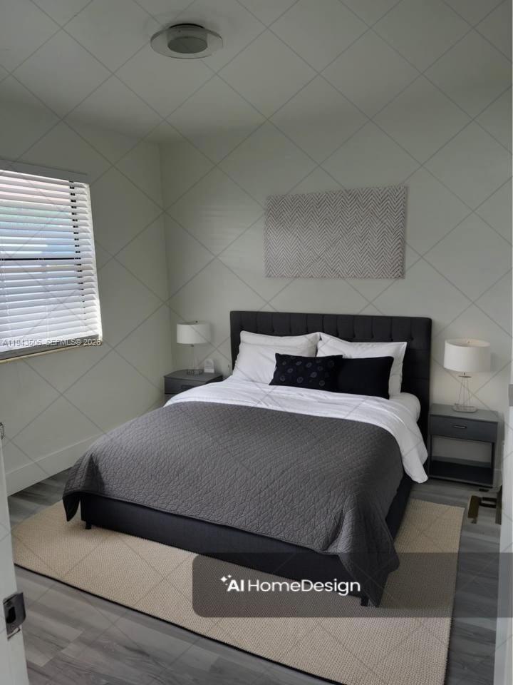 59 East 20th Street, Unit 59 Hialeah, FL 33010 - Photo 7 of 10 a bedroom with a bed and window