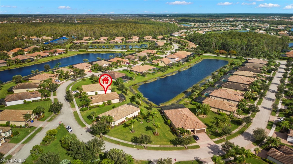 10853 Rutherford Road Fort Myers, FL 33913 - Photo 32 of 42 an aerial view of residential houses with outdoor space