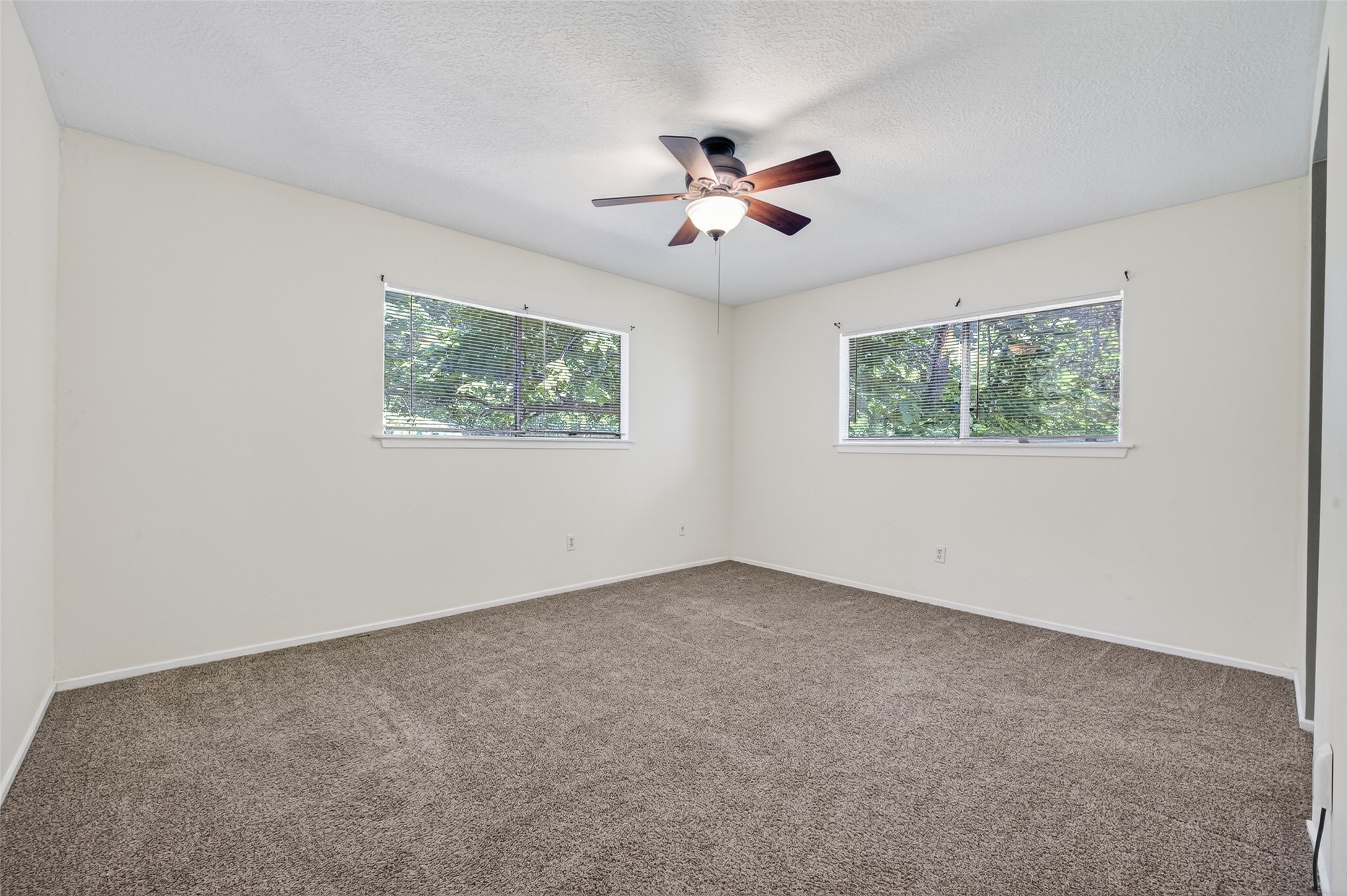 1106 East Red Cedar Circle Spring, TX 77380 - Photo 31 of 43 a view of an empty room with a window
