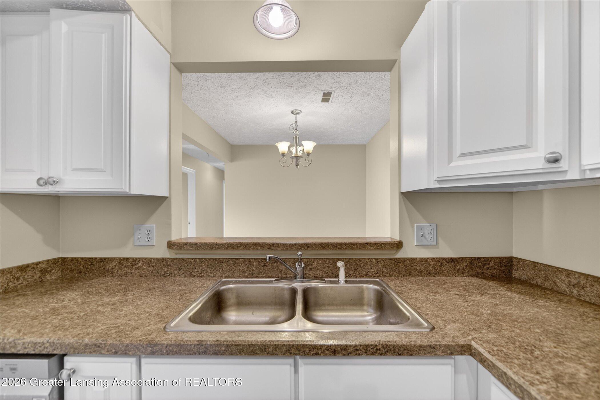 1337 Coolidge Road, Unit 16 East Lansing, MI 48823 - Photo 14 of 31 14-1337-Coolidge-Rd-WindowStill