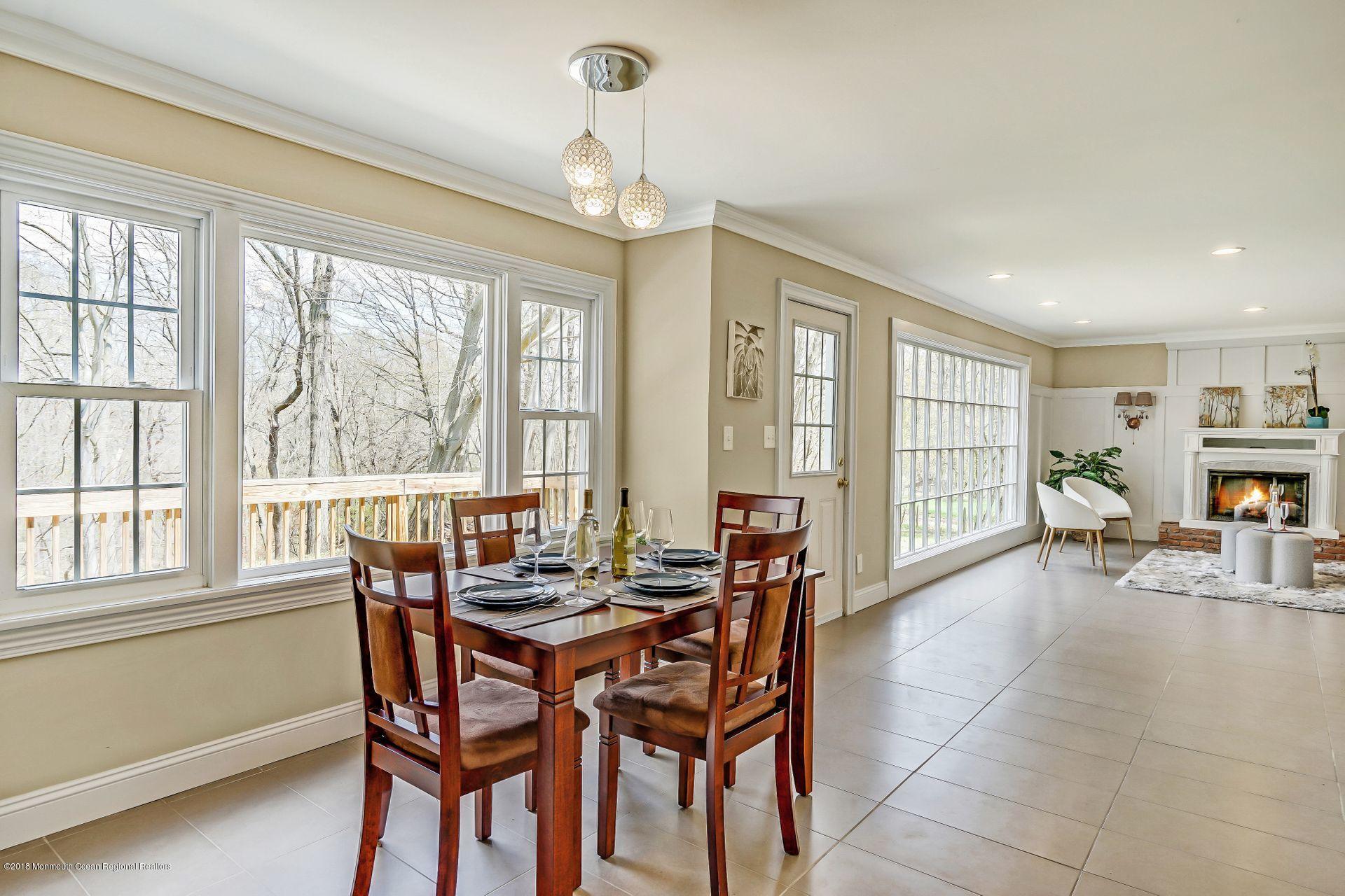 8 Saddle Ridge Road Colts Neck, NJ 07722 - Photo 13 of 35 a dining room with furniture and window