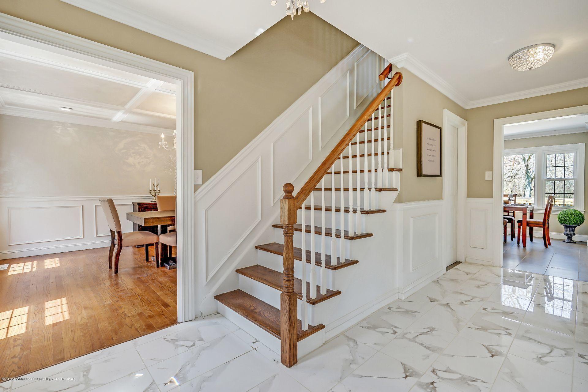 8 Saddle Ridge Road Colts Neck, NJ 07722 - Photo 3 of 35 a view of entryway and hall with wooden floor