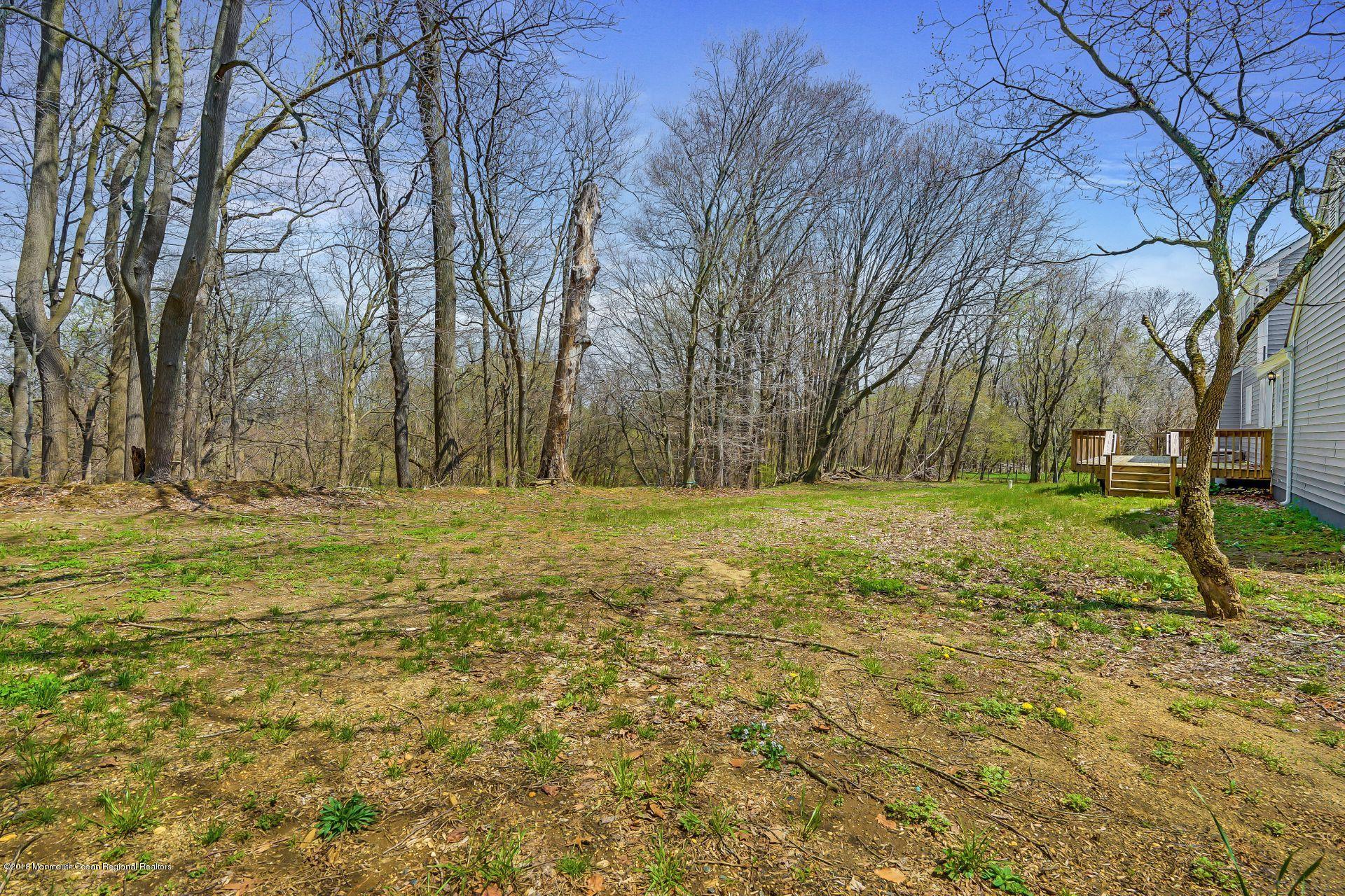 8 Saddle Ridge Road Colts Neck, NJ 07722 - Photo 31 of 35 a view of outdoor space with garden