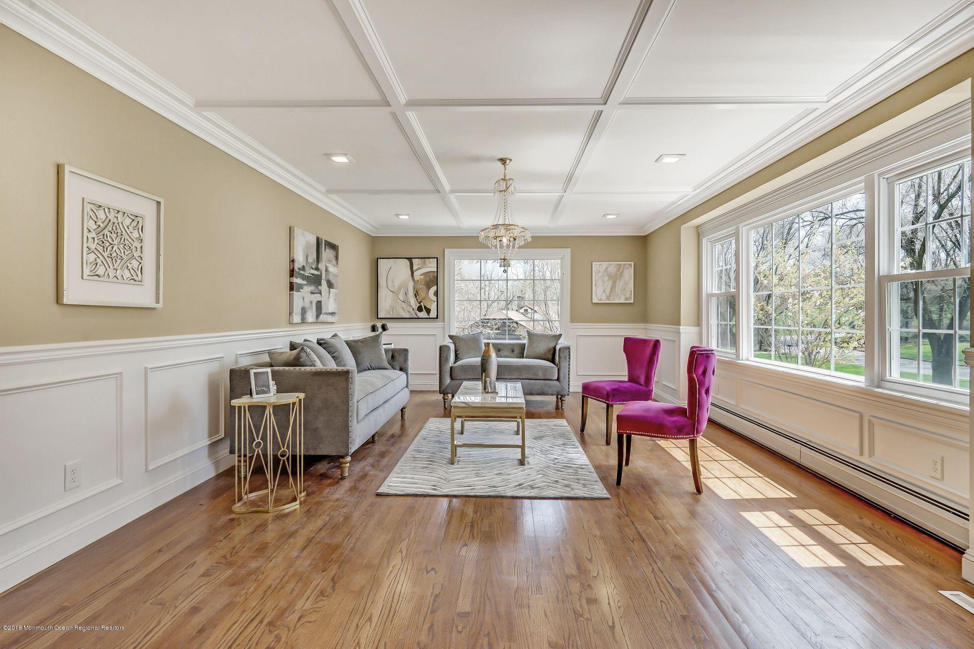 8 Saddle Ridge Road Colts Neck, NJ 07722 - Photo 4 of 35 a living room with furniture and a wooden floor