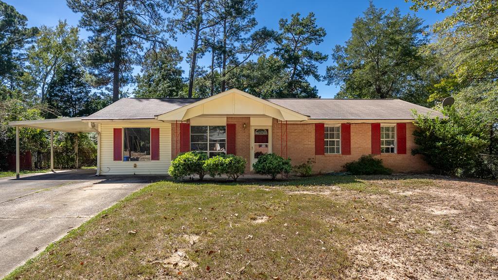 6263 Potomac Circle Columbus, GA 31909 - Photo 1 of 31 a front view of a house with yard patio and green space