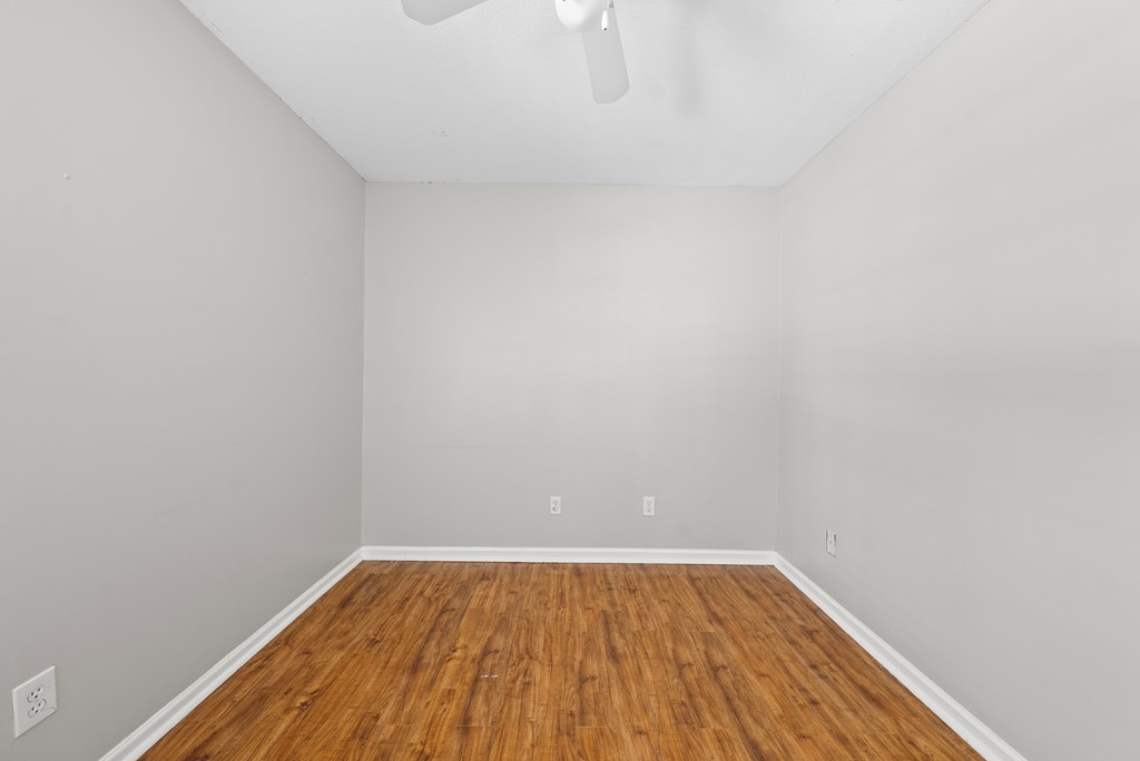 6263 Potomac Circle Columbus, GA 31909 - Photo 16 of 31 a view of an empty room with wooden floor