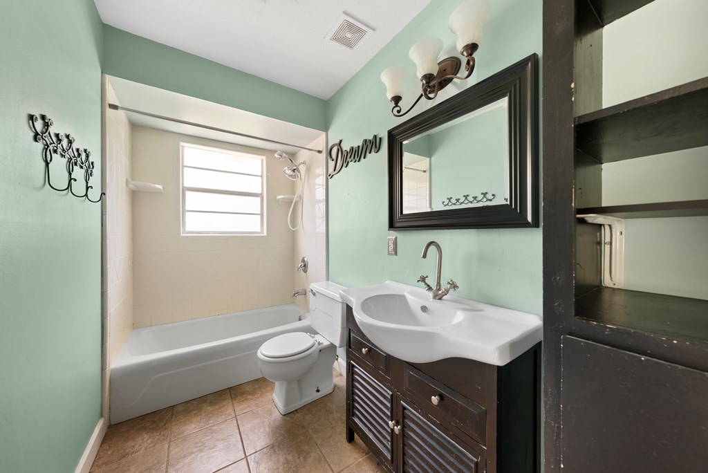 6263 Potomac Circle Columbus, GA 31909 - Photo 17 of 31 a bathroom with a sink a toilet and shower