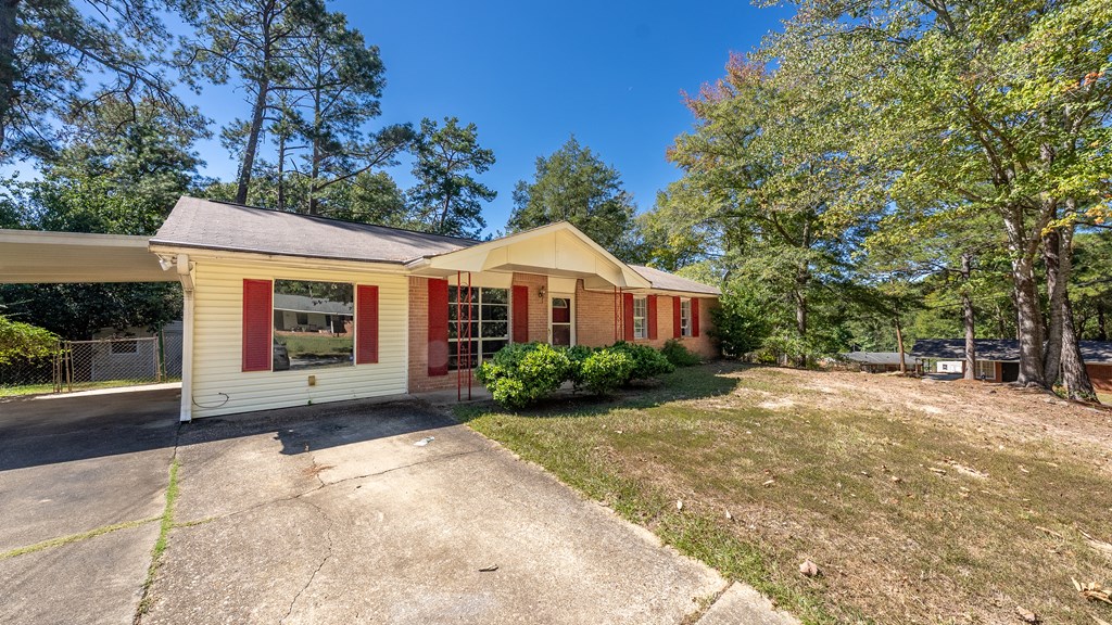 6263 Potomac Circle Columbus, GA 31909 - Photo 2 of 31 a front view of a house with garden