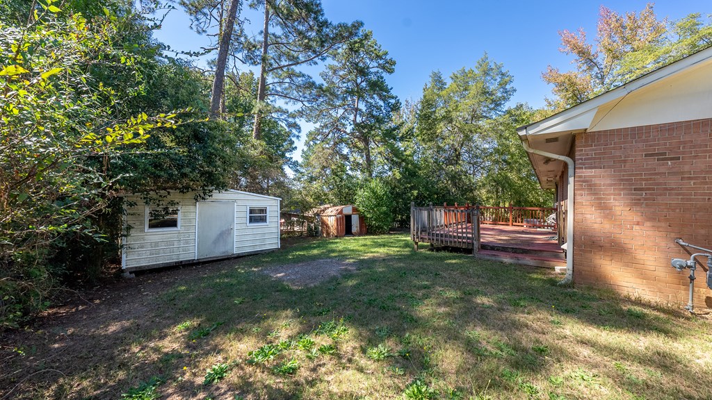 6263 Potomac Circle Columbus, GA 31909 - Photo 27 of 31 a view of a house with a yard and sitting area