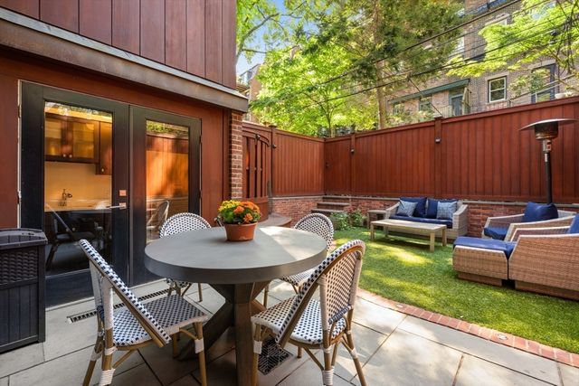 a view of a chairs in patio