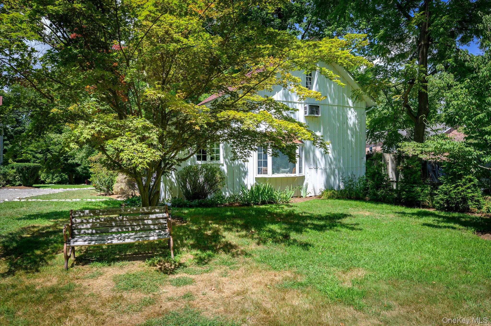 459 Old Post Road Bedford, NY 10506 - Photo 24 of 24 a view of a house with a yard